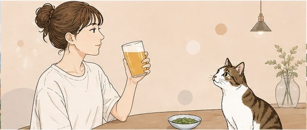猫と向かい合ってお酒を飲んでいるイラスト